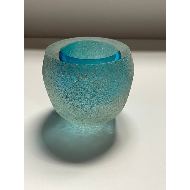 An interesting late 20th century optic glass candleholder in frosted turquoise.