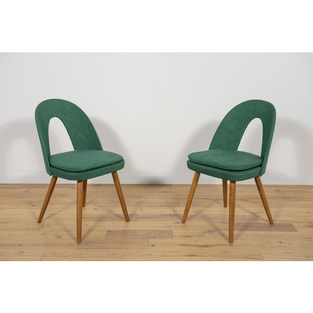 Set of 2 vintage dining chairs by Antonin Suman for Tatra in the 1960s. Wooden elements cleaned, painted with an oak-...