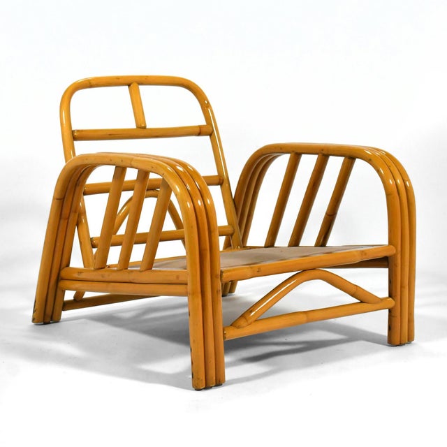 This terrific Ficks Reed rattan lounge chair is perfect for your mid-century pad or tropical Tiki room. It's well made and...