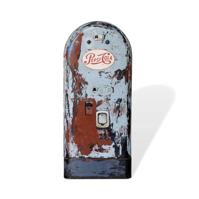 Vending machine of the well-known brand of soft drinks Pepsi-Cola, created by pharmacist Caleb Bradham in the United...