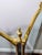 Beautiful vintage tri-fold fireplace screen featuring a polished brass frame with elegant arched tops and beveled glass...