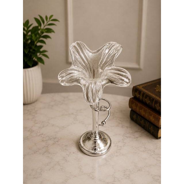 Add timeless elegance to your home with this stunning vintage hand blown art glass lily vase displayed in an ornate...