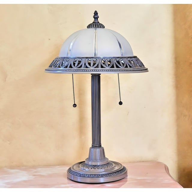 Modern metal desk lamp with 2 pull chain switches and frosted glass and gilded metal shade. This lamp presents with simple...