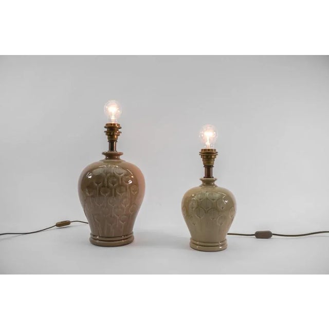 Two scandinavian ceramic table lamps with great leaf pattern, 1960s executed in brass and glass. Each lamp need 1 x e27 /...