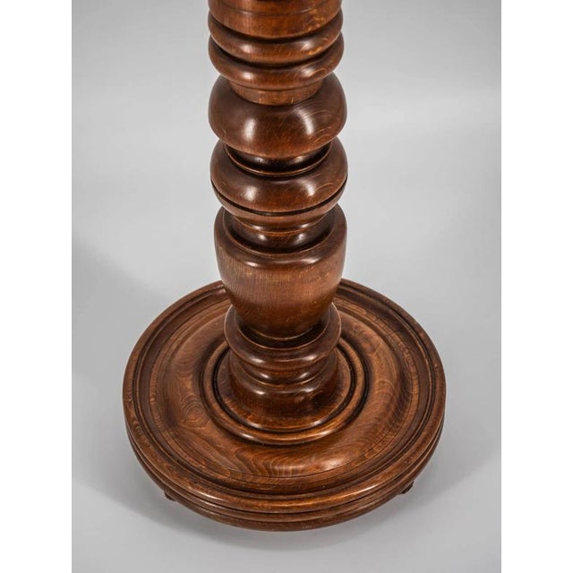 Solid oak base decorated with rich turning. Condition: good, no wormholes. Date: around 1930. Provenance: Belgium....