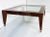 Vintage Enrique Garcel Mahogany Coffee Table with Inset Beveled Glass Top Offered for sale is a mahogany coffee table with...