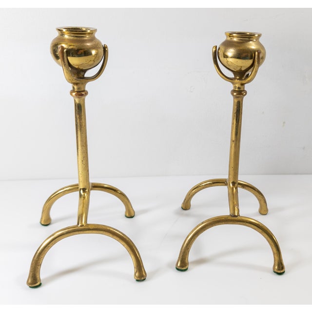 We are selling this cool pair of Arts and Crafts style brass or bronze candlesticks. These are unmarked but are clearly...