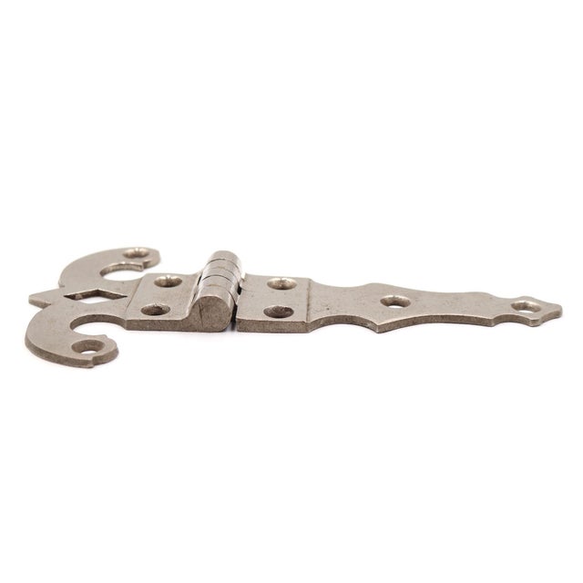 Vintage ice box door hinge made of brass with a nickel finish. The original mounting screws are not available. Good...