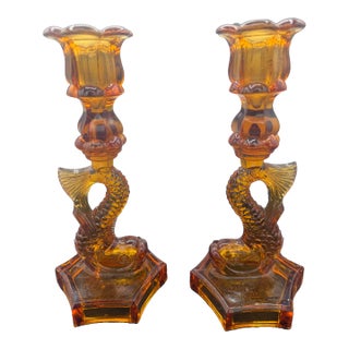 1950s Pair of Amber Colored Glass Dolphin Candlesticks For Sale