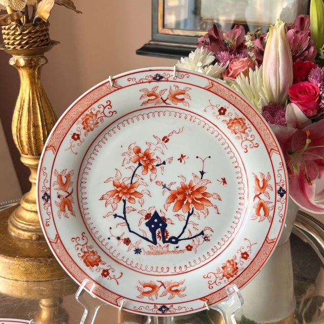 I must assert up front that I am not an expert at Chinese porcelain, but the hand-painted mark on the back of each plate...