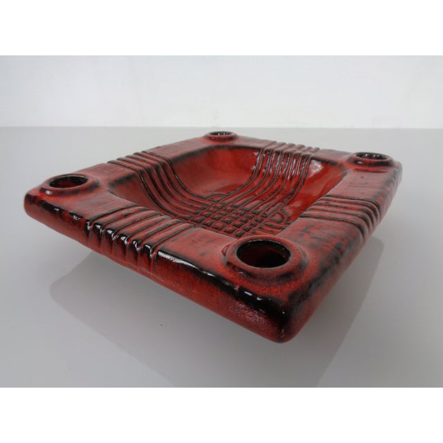 Ceramic candle holder for 4 candles by Dümler & marked on the underside. This piece has an attribution mark, I am sure...