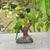 This charming realistic parakeet figurine brings a touch of nature and color to any interior or garden space. Crafted from...