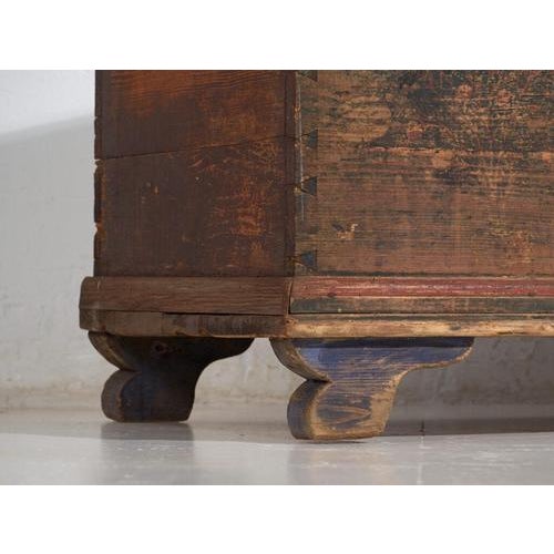 Antique folk art chest made from painted pine wood and dating from the early 20th century, circa 1900–1920, originating...