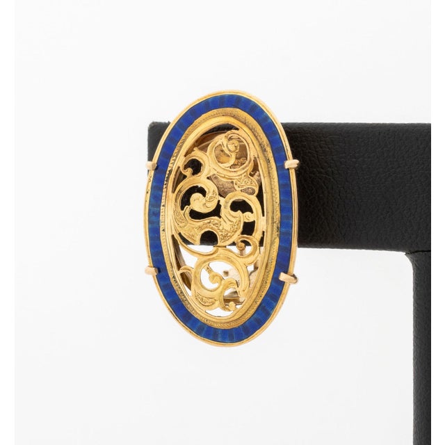 Pair of Cobalt Blue Enamel and 18K and 14K Yellow Gold Filigree Earrings, featuring two prong set 18K yellow gold oval...