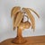 Stunning rattan lamps shaped like coconut palms. Each lamp features six removable fronds (convenient for transport) and...