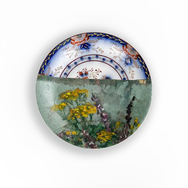“"Meadow Flowers in Brown Vase” belongs to our “Altered Perspectives” series: assemblages of ceramic plates layered with a...