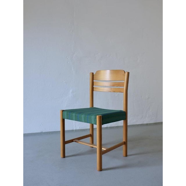 Set of 8 minimalist pine chairs with upholstered seats. Comfortable and lightweight. Condition: Good vintage condition...