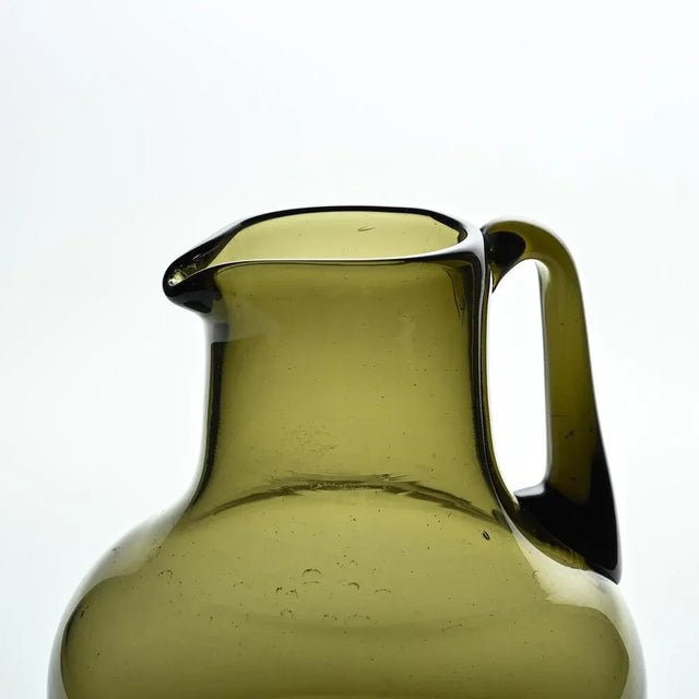 Large blown glass jug by Claude Morin, a key French artist in the revival of glass art in the 1970s. Based in Dieulefit,...