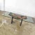 Magnificent Italian Postmodern style dining table signed by Pietro Costantini. Comprised of a concave curved rectangle...