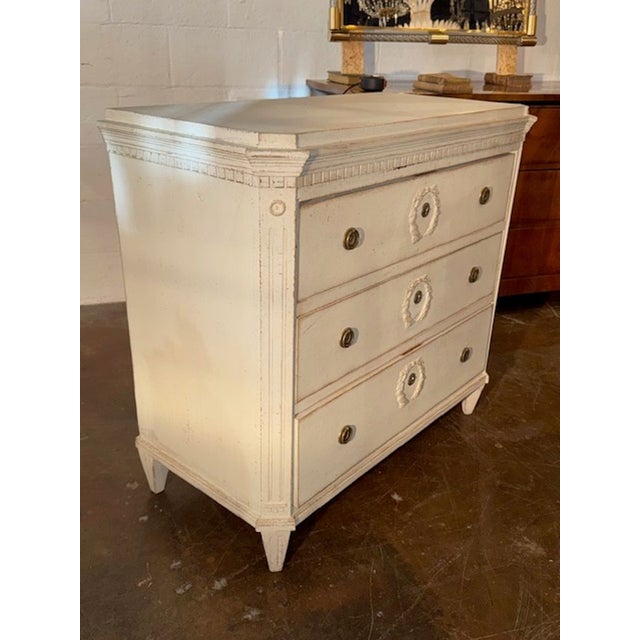 Vintage Swedish Gustavian carved and painted chest. A Swedish Gustavian carved and painted chest is a hallmark of...