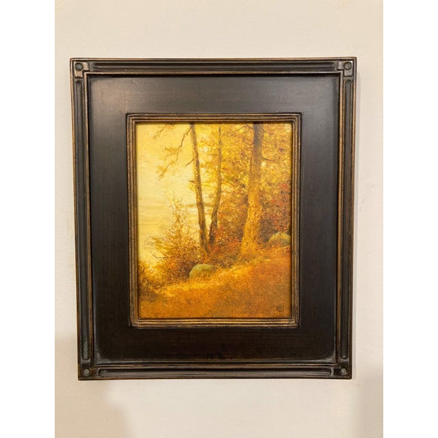 The painting depicts a serene autumn landscape, where golden hues dominate the scene, creating a warm and inviting...