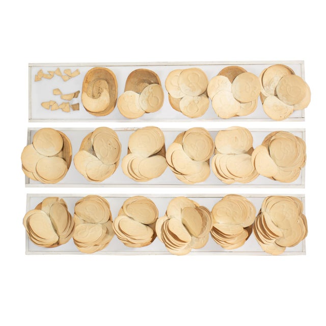 A signed assemblage triptych wall sculpture by the American artist James Spencer Russell (1915-2000). Signed "James...