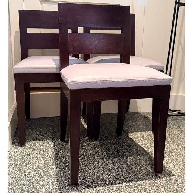 Set of Three Christian Liaigre Archipel Chairs In a collaboration with Holly Hunt, these three wide slat back chairs are...
