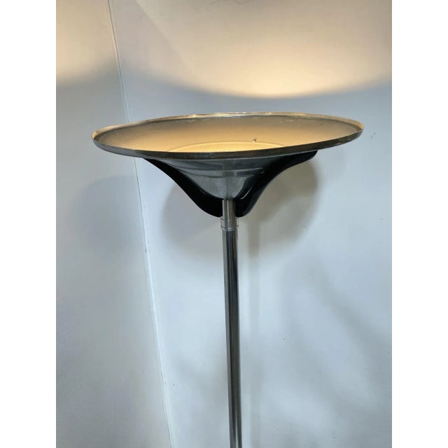 This Mid-Century Modern (MCM) floor lamp embodies the sleek and futuristic design sensibilities of the era. Crafted from...