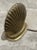 Good condition This heavy, well-made piece features a classic clam or scallop shell design set upon an oval pedestal base....