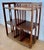 Small antique oak shelving unit in the Arts &amp; Crafts style, dating from the 20th century. This compact piece features...