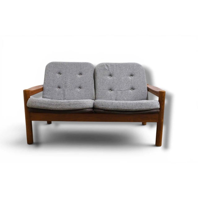 A beautifully crafted Danish modern loveseat by Domino Møbler, showcasing the clean lines, exceptional craftsmanship, and...
