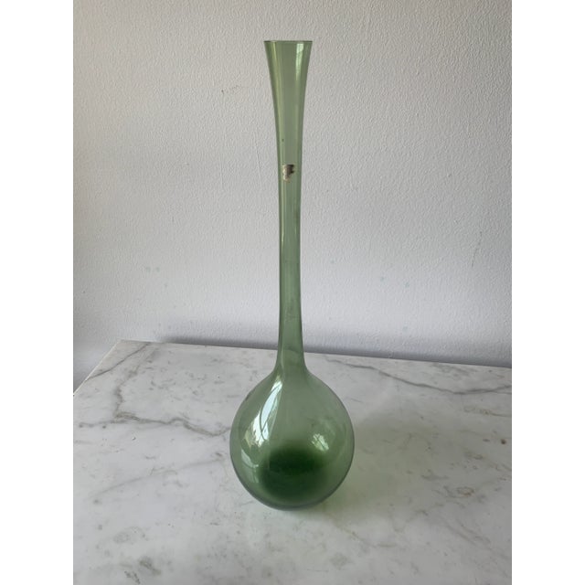 The Large and impressive hand-blown bulb vase by Arthur Percy, made in Sweden by Gullaskruf, is a stunning piece that...