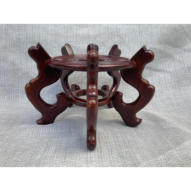 Vintage round rosewood jar or vase footed stand. Very good condition. No makers mark. Stand measures 7" in diameter by 4...