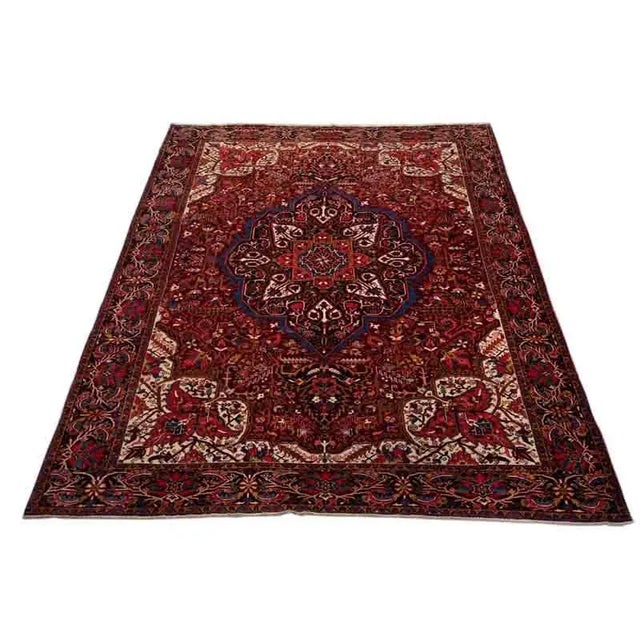 ACTUAL SIZE: 11’7″ x 15’2″ PRIMARY COLOR: Rust / Navy AGE: Old MATERIALS: Wool FOUNDATION: Cotton PRODUCTION: Handwoven,...