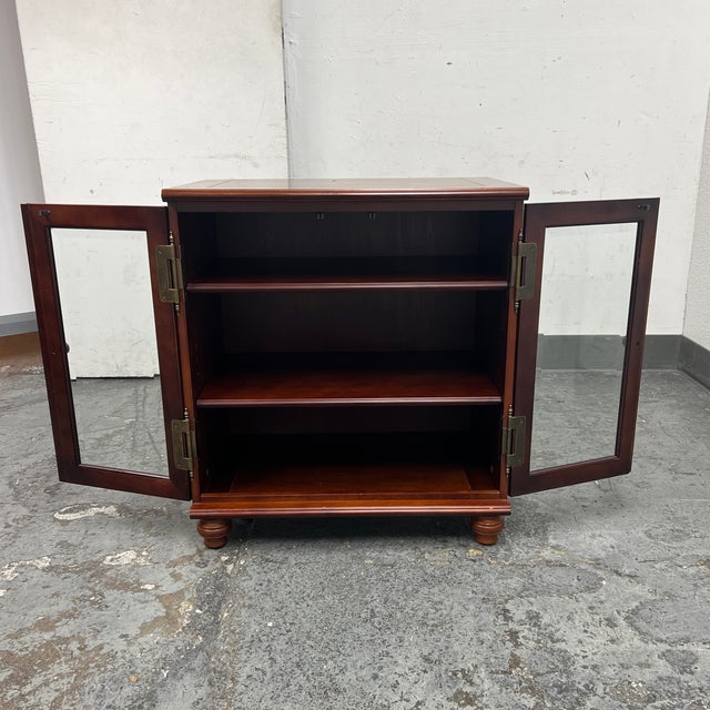 Design Plus Gallery presents a Vintage Media Cabinet from The Bombay Company. British Colonial in styling this sweet...