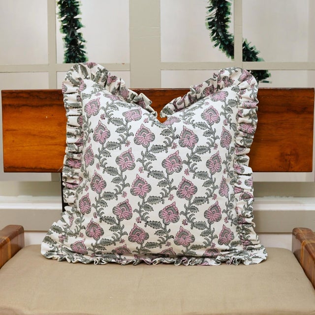 Bring artisanal elegance to your interiors with this Block Print Ruffle Throw Pillow, featuring the timeless Madubala...