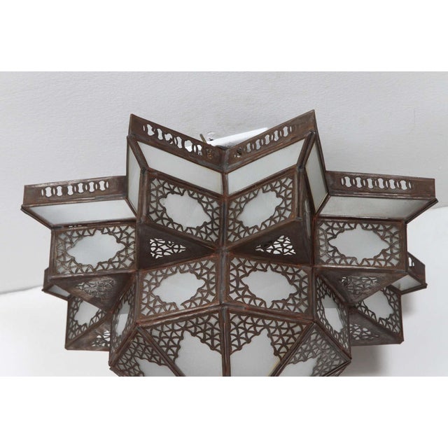 Moroccan hanging glass star shape lantern pendant shade. handcrafted Moroccan Spanish style metal frame and frosted glass...