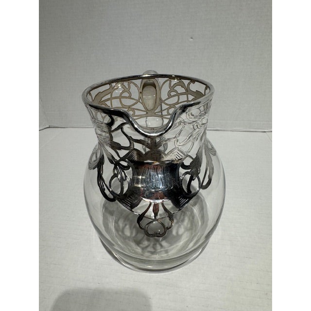 This is a gorgeous Art Nouveau designed Water Pitcher. I love the initials and it appears to be "C Le G C". It is very...