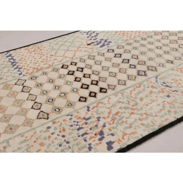 This magnificent 8x10 Abstract Geometric rug from Rug & Kilim’s Modern Collection is a deconstructed work of art, hand-...