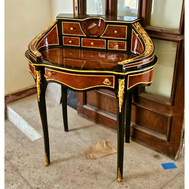 Add timeless elegance to your home with this exquisite French-style writing desk, featuring a graceful kidney-shaped...