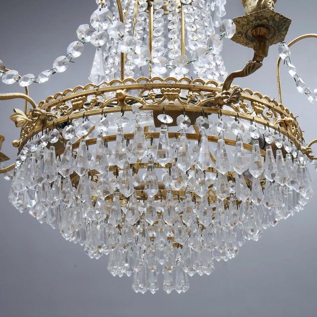 A prism chandelier from Sweden from the time of the turn of the turn. The diameter is 55 cm and the height is 62 cm. The...