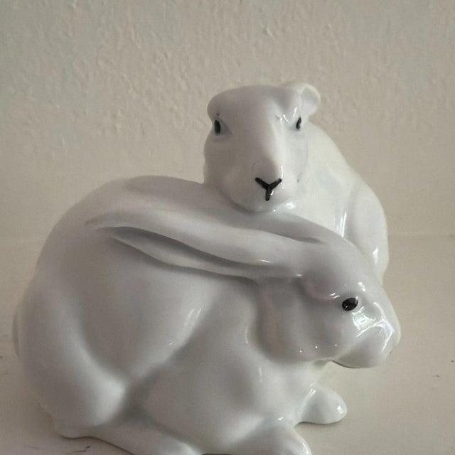 The Gerold Porzellan Playful Bunnies Vintage Figurine from Bavaria, W. Germany is a charming figurine depicting playful...