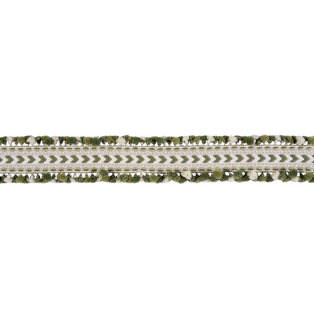 Inspired by traditional Peruvian textiles, Maracana Pom is a dimensional woven trim with playful, multi-colored pom-poms....