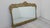 Mirror in a gilded wooden frame in the Baroque style Stylish mirror in a gilded wooden frame in the Baroque style. The...