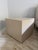 Dado bedside table. Frame is MDF wood paneling in a satin tan finish. Drawers are glossy lacquered melamine. Top Drawer in...