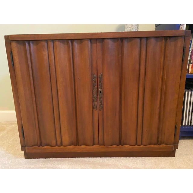Mid century modern cabinets (1959). These are in like new condition, one family. They have an adjustable shelf and an...