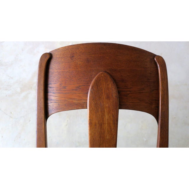 Striking art nouveau / Jugendstil side chair in solid oak, seat with original springs in very good condition, covered with...