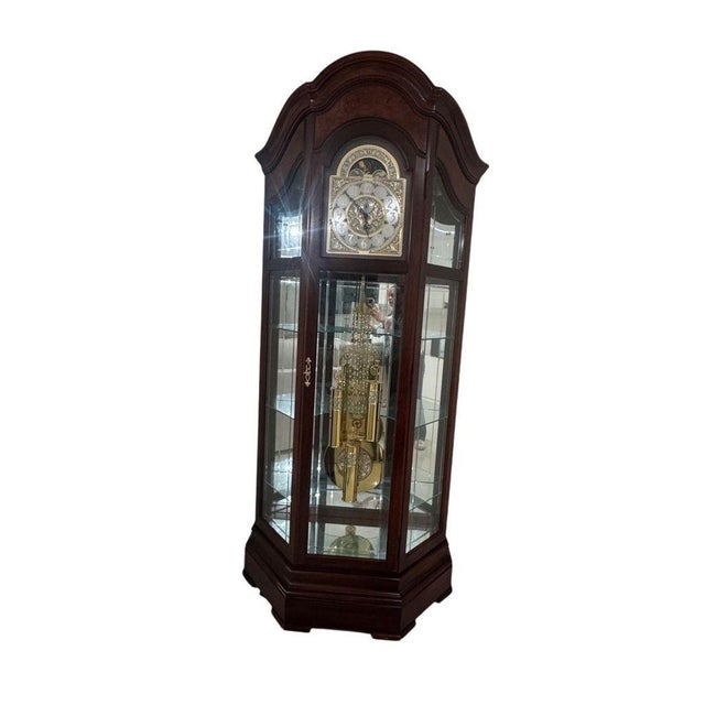 A distinguished example of American clockmaking, this Howard Miller Majestic II Grandfather Clock (Model 610-939, Serial #...