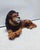 Unique handmade statue of a lion. This Hollywood Regency statue, crafted from hand-painted ceramic and made in Italy, will...