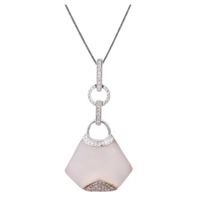 Diamond wt 0.23cts semi precious wt 8.20cts gold net wt 3.224gm(18k)